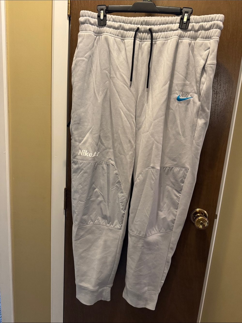 Men’s Nike Air Light Gray Jogger Sweatpants with Blue Swoosh
